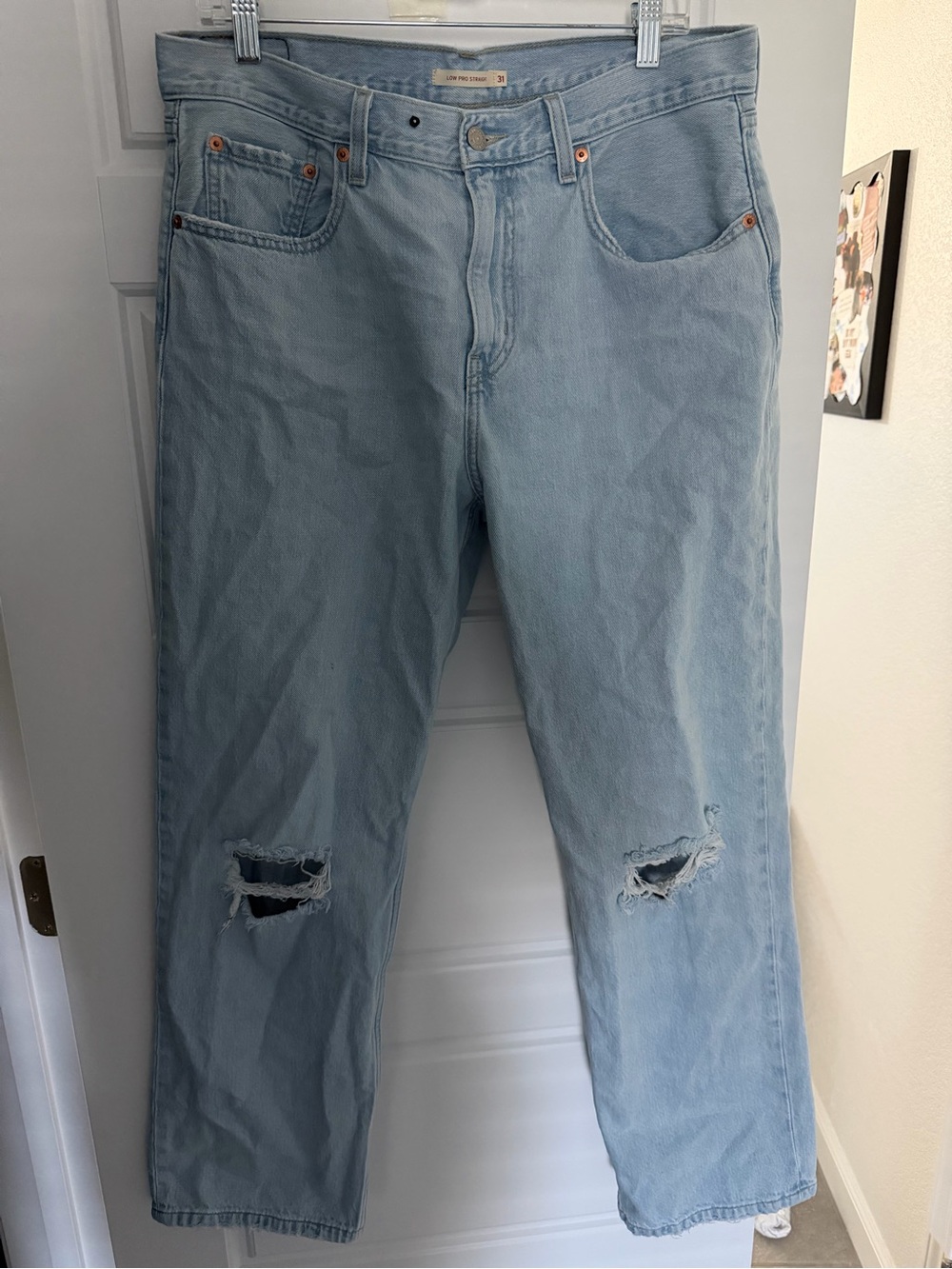Women’s Levi’s Low Pro Light Blue Straight Jeans with Knee Rips Size 31